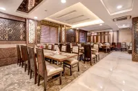 Treebo Riddhi Paradise - 15 Mins from Airport