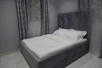 Cozy 1-bedroom apartment with WiFi , cleaning in lovely Munyonyo Kibiri 住宿飯店