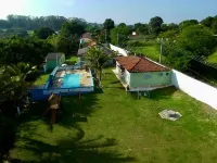 Farm with swimming pool, kiosk, barbecue, soccer field, play ground.