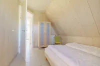 Vacation home in a unique location at the foot of the dunes