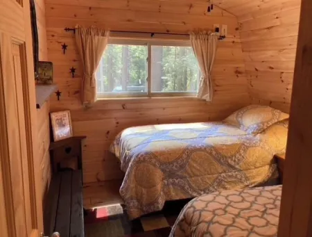 Famous cottage directly on 100' private shoreline of pristine lake.