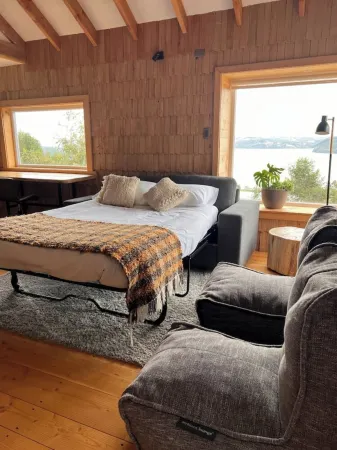 Window to the Fjord: Cabin with Stunning View Отели в г. Чилоэ