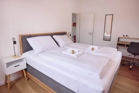 Design apartment with king-size beds & balcony Отели в г. Пфорцхайм