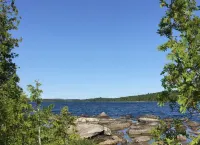 Log Cabin On Quiet Wilderness Lake In Downeast Lakes Region Of Maine