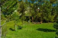 Charming Creekside Escape with Hot Tub and Two Kitchens - Cozy Haven