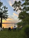 Waterfront Oasis w/ Private Dock, Firepit, Arcade & Sunset Views