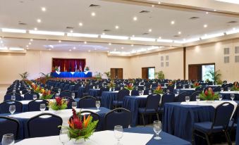 a large conference room with rows of tables and chairs , all set for a meeting or event at Barcelo Tambor - All Inclusive