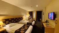 Perissia Hotel & Convention Center Hotels near Turasan