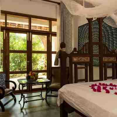 Tikitam Palms Boutique Hotel Rooms