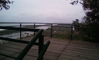Hotel Cabinas y Tour Aaron Tortuguero - Housity