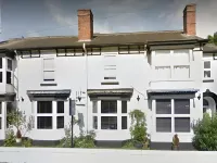 Tennyson Hotels near Birchwood Shopping Centre