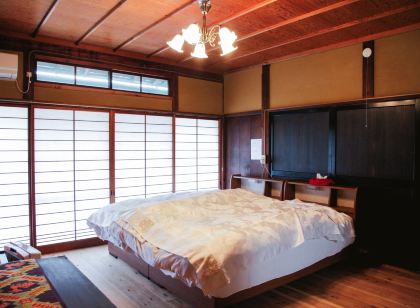 A 100Yearold Traditional House with Nature