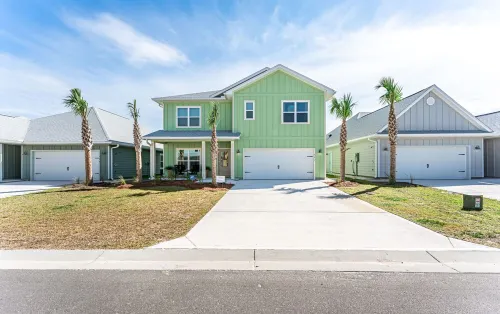 Beach House with Golf Cart, Grill & Two Pools!