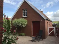 Four stars at the harbor: Modern renovated fisherman's house directly at the Ditzumer harbor