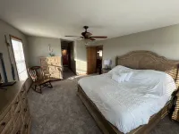 Country home with lake access and game room.