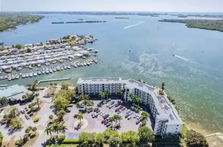 Top-Floor Waterfront Condo with Bay View + Pool and Hot Tub