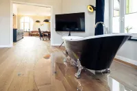 Bright loft apartment close to the beach in a quiet location