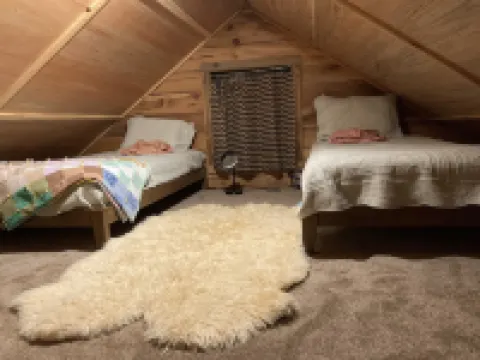 Remote cabin with creek and waterfall views 10 min from town