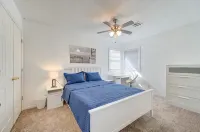 King bed with Pool table, decked patio and, gym.