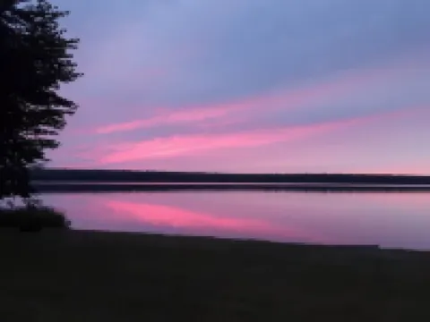 Beautiful Huron Bay sunsets from your own private beach. Hotels in Baraga County