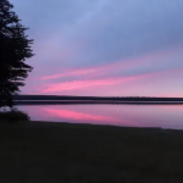 Beautiful Huron Bay sunsets from your own private beach.