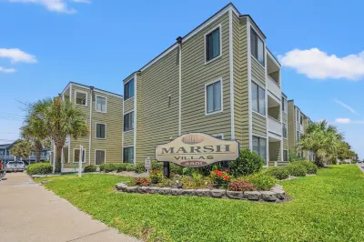 2-bedroom condo in N. Myrtle Beach offers the peace of the waves within a walk. Hotels near Beach Bookshop & Video