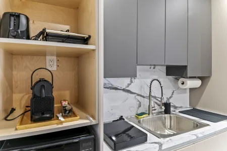 XL Luxury Room. Luxurious studio retreat with sleek designs.