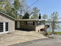 Experience Kentucky Lake out the back door! Spacious 4-bedroom retreat awaits. Hotels in Calloway County