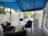 Cozy Poolside Cottage with Tropical Gardens - Charming Island Retreat