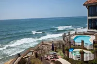 Ocean View and Resort-Style Amenities - Stylish Coastal Retreat