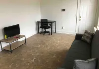 Spacious and Bright 2 Bedroom Apartment with 1 Bathroom and Private Street Entrance Hotels in Paterson