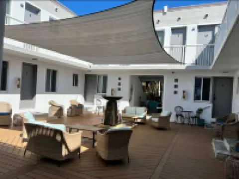 Beach Chairs and Inviting Dining Area - Charming Retreat
