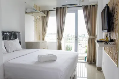 Minimalist Studio Apartment at Poris 88 with City View