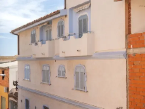 ซู บาร์คิเล โรงแรมในOrosei