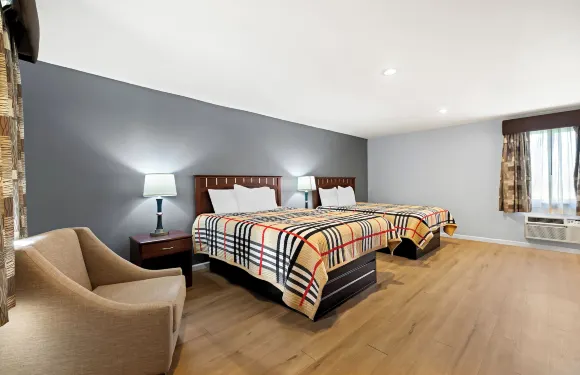 村莊避風港客棧及長住酒店