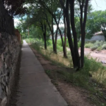 Luxurious and sanitized Studio, original adobe walls, wood floor, real sanctuary