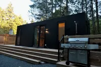 Cozy new cabin in Tofino, blend of luxury and nature. Close to beaches and town Hoteles en Tofino