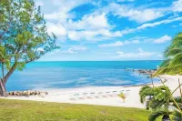 2023 Renovated The Retreat 17 Oceanview ground floor condo steps to ocean/beach