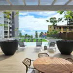 Jaco Beachfront Oasis 2-bedroom condo on Jaco Beach with AC, fitness room, WiFi