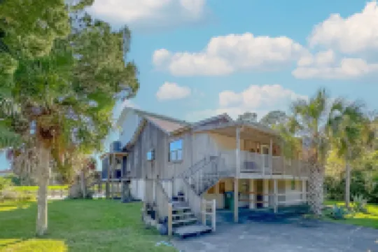 Big Canal-front house, kayaks, canoes, game room, fish right from the dock.