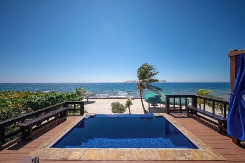 Coral Beach Retreat – Private Beachfront Escape