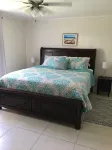 Beautiful gated spacious condo 5 minute walk to beach, restaurants and Hip Strip Hotel a 