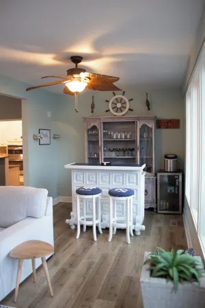 Spacious 7-bedroom, 5-bath home on 168' of a wide, deep-water cove.