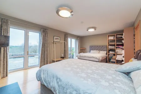 Dundarragh Lodge, Stunning North Coast Villa With River Views & Hot Tub For 20+