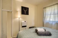 Charming Green Cabin with Private Round Lake Access, Minutes from Ludington