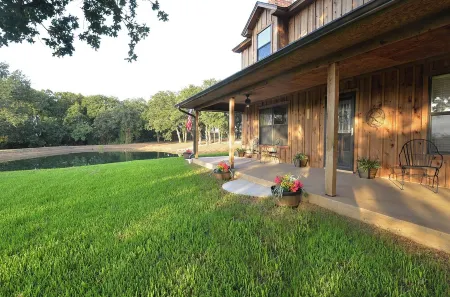 4-bedroom farmhouse in charming Burleson with WiFi, AC. Book now