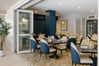 voco DARWIN SUITES by IHG - 朝食