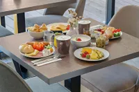 Leonardo Hotel Salzburg City Center - breakfast