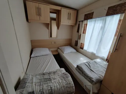 Grands Mobil homes 8 couchages clim en village vacances