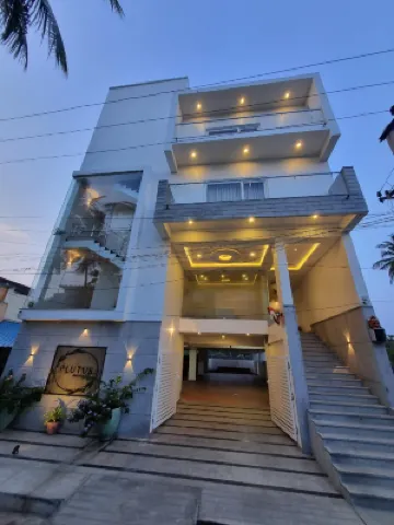 Plutus Residency Hotels near Auro Beach
